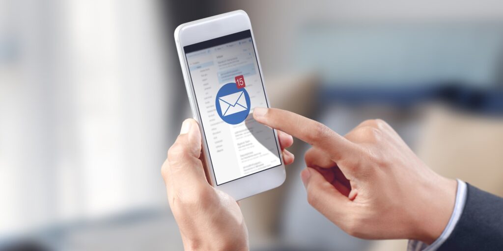 A person is tapping on the mailbox of his phone